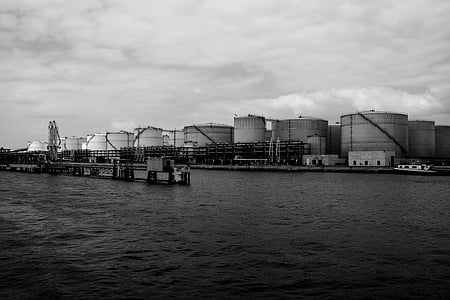 grayscale photo of oil structures thumbnail