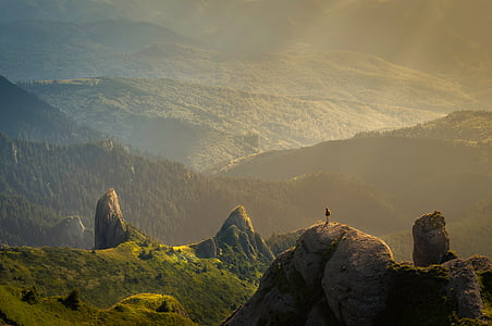 person standing on cliff thumbnail