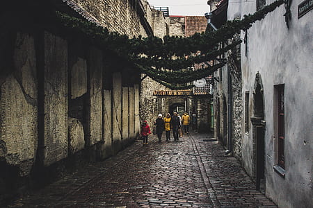 People on the Street Between Houses thumbnail