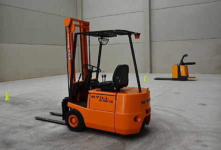 orange forklift inside room thumbnail