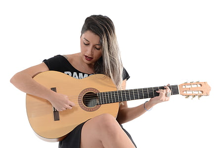 woman in black shirt holding beige guitar thumbnail