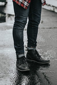 person standing on wet ground thumbnail