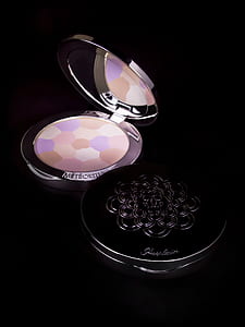 opened round multicolored pressed powder thumbnail