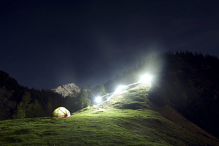 yellow dome tent on green mountain thumbnail