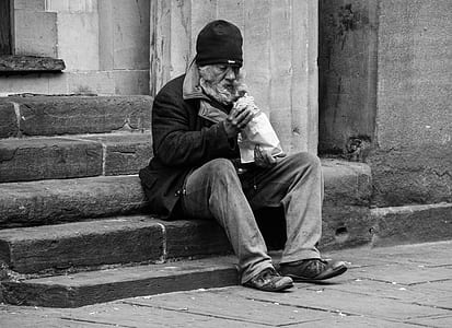 man sitting on stair thumbnail