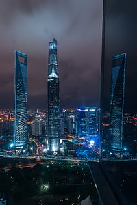 lighted buildings at night thumbnail