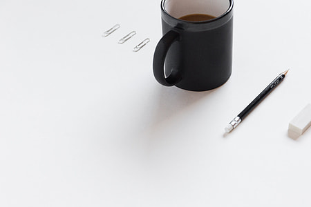 flatlay photography of mug beside pencil thumbnail
