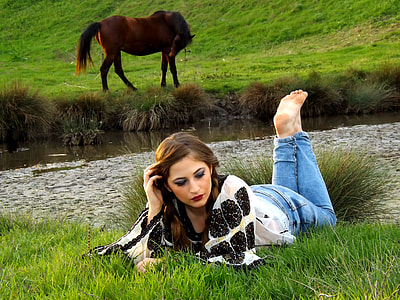 woman lying on grass thumbnail
