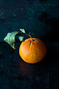 orange fruit on black surface thumbnail