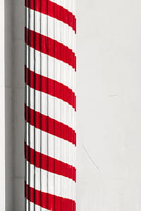 white and red concrete pole thumbnail