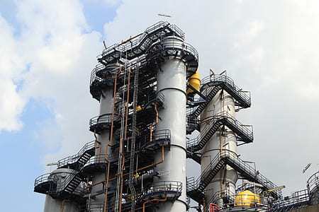 low-angle photography of white power plant thumbnail