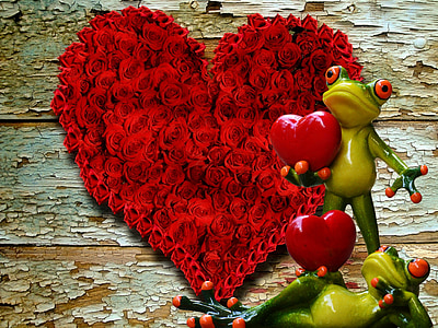 frog holding red heart figurine thumbnail