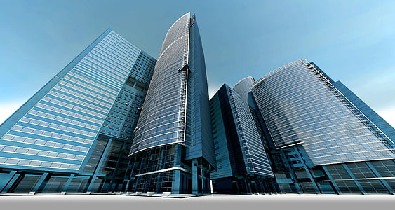 gray high-rise building under blue sky thumbnail