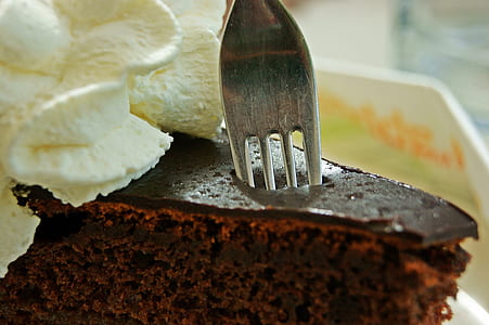 slice of brownies with stainless steel forkl thumbnail