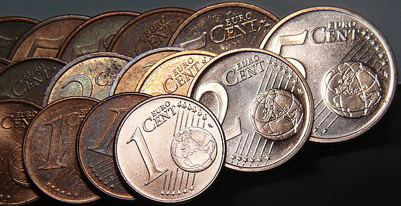 assorted round silver-and-colored coins thumbnail