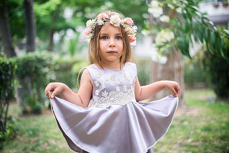 girl wearing purple dress holding it up thumbnail
