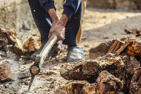 Person Smashing Pick Axe On Ground thumbnail