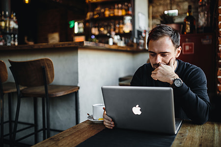 Young Entrepreneur Working from a Modern Cafe thumbnail