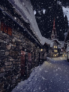 village surrounded by snow thumbnail