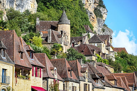concrete houses near mountain thumbnail