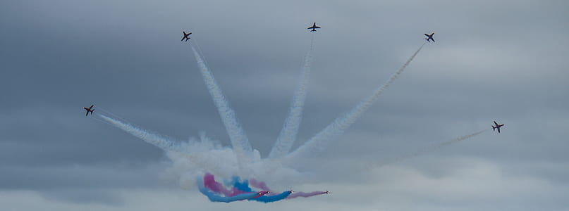 fighter planes doing exhibition in the sky at daytime thumbnail