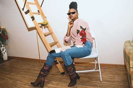 Woman Wearing Pink and Red Floral Jacket thumbnail
