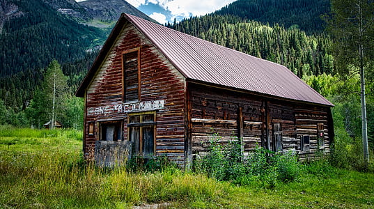 landscape photo of house and green grass field thumbnail