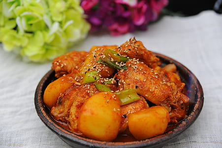 meat dish on black bowl thumbnail
