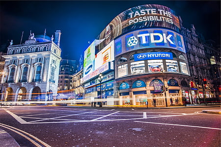 time-lapse photo of concrete building with signage thumbnail