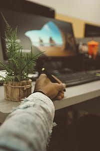 person writing on desk thumbnail