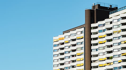 white and brown concrete building during daytime thumbnail