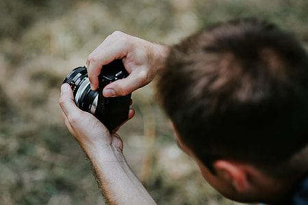 Photographer taking photos of a beautiful, young woman thumbnail