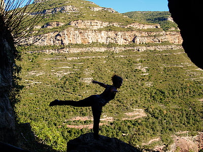 person's silhouette on top of mountain during daytime thumbnail