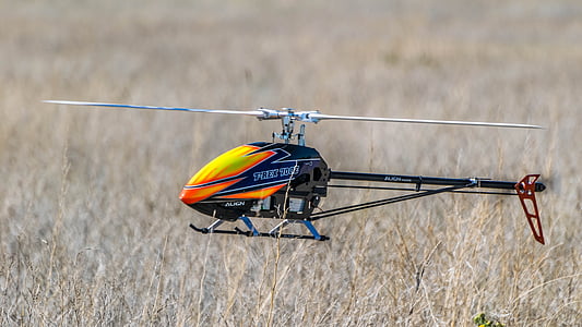orange and black helicopter toy thumbnail