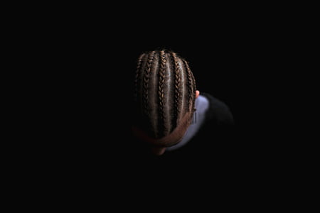 person in braid hair thumbnail