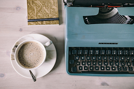 Working with old typewriter in the rainy day thumbnail