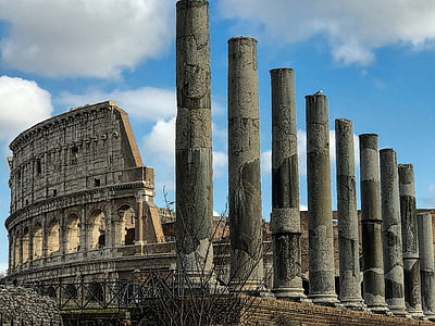 gray stadium ruins under cloudy sky thumbnail