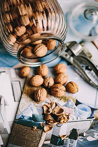 Jar full of walnuts with a fresh healthy shake and musli in a bowl thumbnail