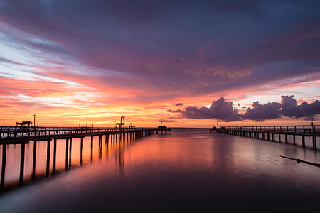 two docks during sunset thumbnail