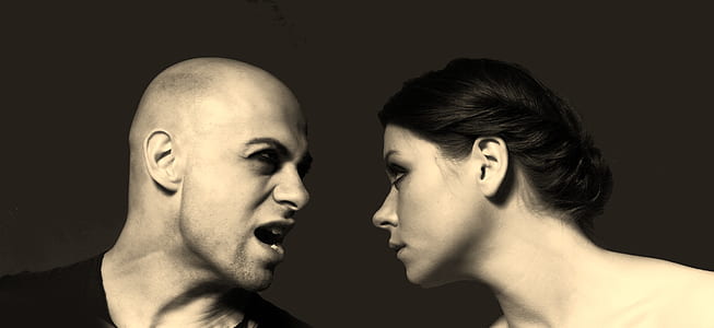 man and woman on grayscale photography thumbnail