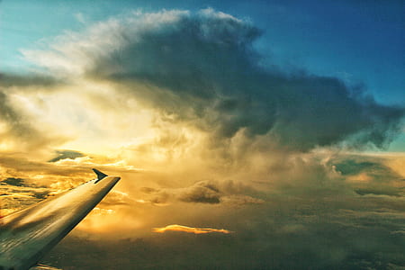 right wings of airplane on sky during daytime thumbnail