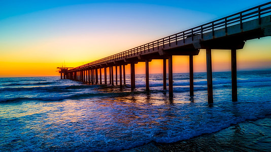 black and gray steel dock during sunset thumbnail