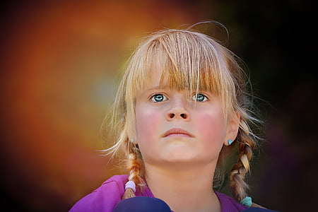 close-up photo of girl wearing purple top thumbnail