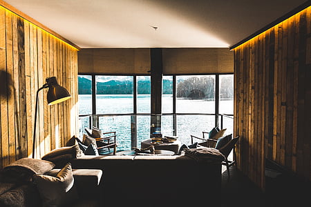 empty brown wooden room viewing body of water thumbnail