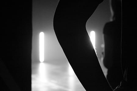grayscale photography of person's elbow thumbnail