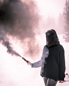 woman holding bomb spray thumbnail
