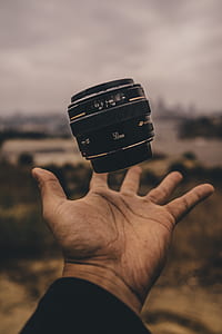 black 50mm DSLR camera lens thumbnail