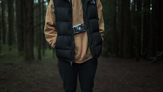person wearing black and brown jacket and pants thumbnail