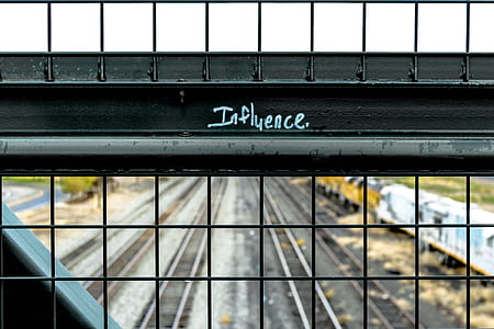 minimalist photography of influence paint on grill thumbnail