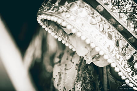 selective focus photography of woman wearing traditional dress thumbnail